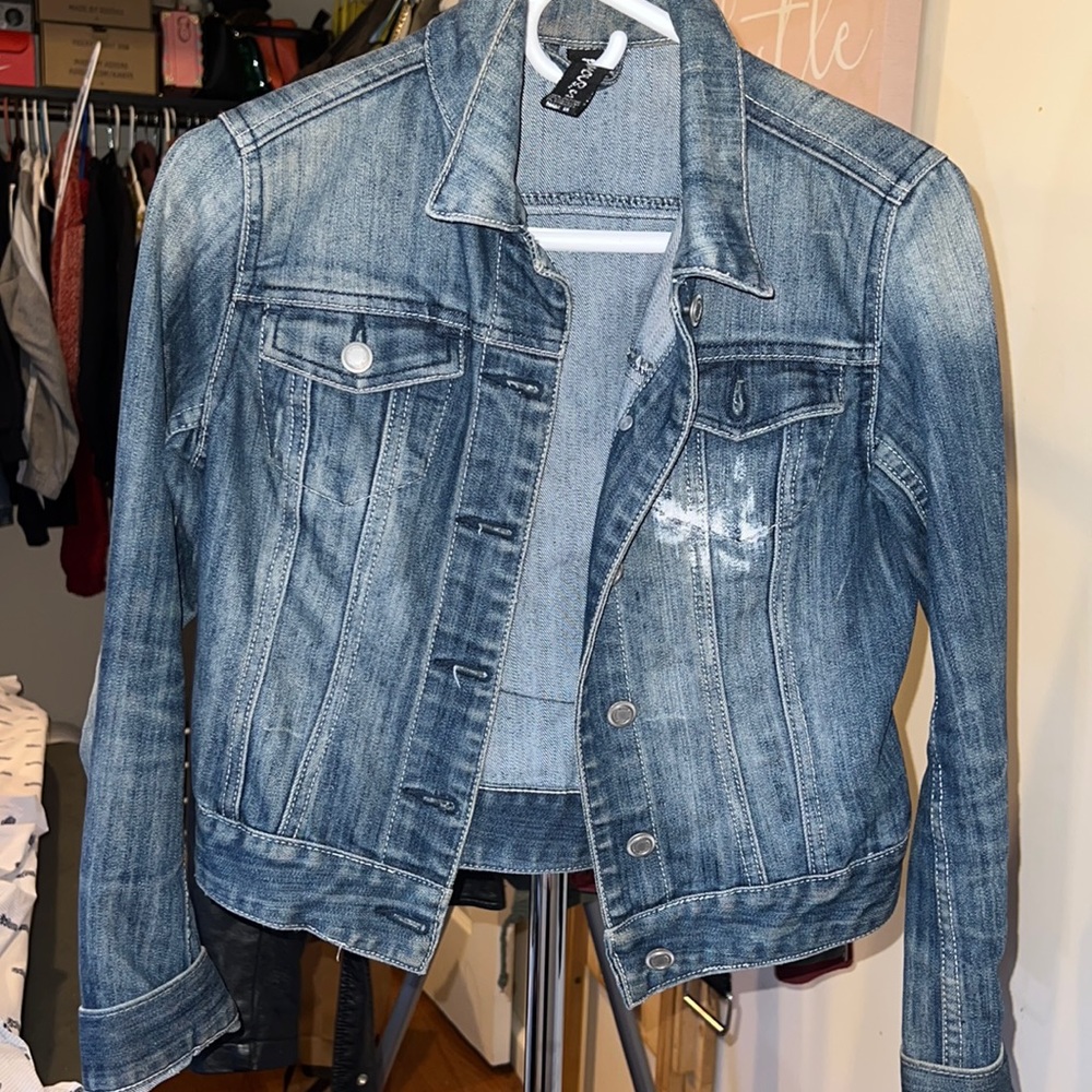 Distressed jean jacket crop